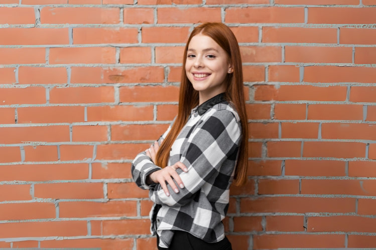 A teenager with a straight smile